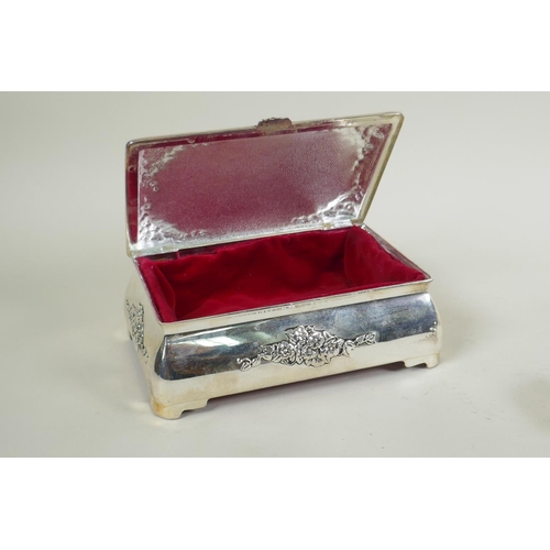 632 - A pair of Mappin & Webb silver plated salts, a silver plated bombe shaped jewellery casket and a... 