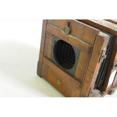 7 - E & T Underwood, Birmingham, a mahogany cased plate camera, retailed by Benetfink & Co, 17 x... 