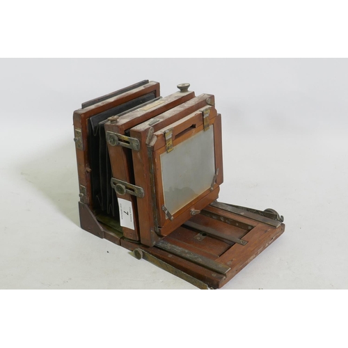 7 - E & T Underwood, Birmingham, a mahogany cased plate camera, retailed by Benetfink & Co, 17 x... 