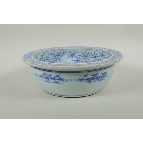 78 - An early C20th Chinese blue and white porcelain steep sided bowl decorated with armed figures, 27cm ... 