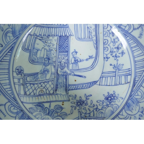 78 - An early C20th Chinese blue and white porcelain steep sided bowl decorated with armed figures, 27cm ... 