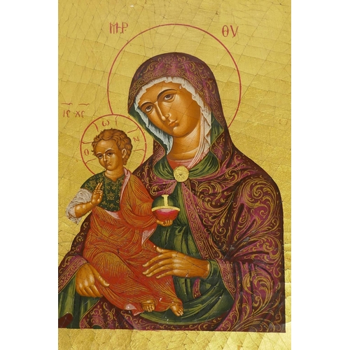 854 - A hand painted and gilded icon, late C20th, 15 x 19cm