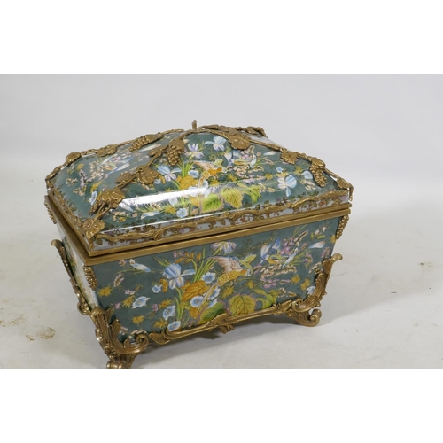 91 - A porcelain casket decorated with exotic birds and brass mounts with grape and vine detail, 37 x 27 ... 