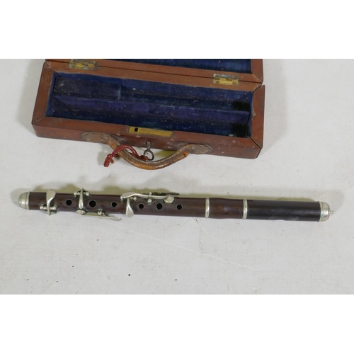 97 - A piccolo in wood case,AF, 30cm long