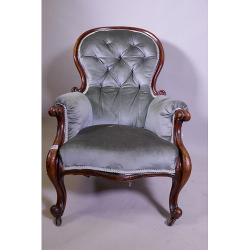 1230 - A Victorian spoon back walnut armchair, raised on cabriole support, back legs AF