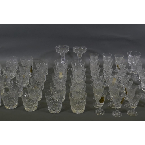 10 - A suite of Webb Corbett lead crystal glassware to include 25 tumblers, 9cm, four smaller tumblers, 7... 