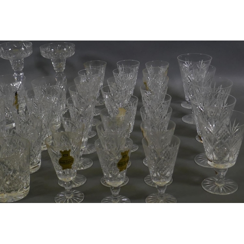 10 - A suite of Webb Corbett lead crystal glassware to include 25 tumblers, 9cm, four smaller tumblers, 7... 