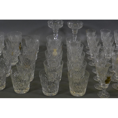 10 - A suite of Webb Corbett lead crystal glassware to include 25 tumblers, 9cm, four smaller tumblers, 7... 