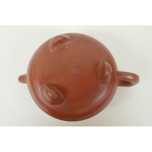 108 - A Chinese YiXing teapot of squat form with a ram shaped knop and enamelled floral decoration, 12cm d... 