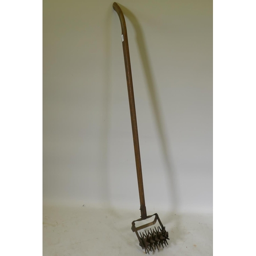 1080 - Antique American gardener's lawn spiker, stamped 'Planet Jr', star pulverizing hoe, 7½