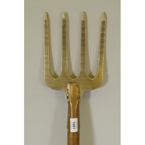 1081 - An artisan constructed copper and bronze garden fork, stamped PKS