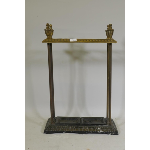 1085 - A painted metal and brass stick stand, 45 x 20 x 64cm