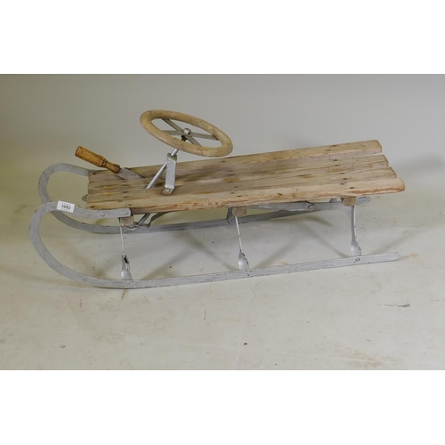 1092 - A Swedish ice sled, with brake and steering rudder, 92cm long