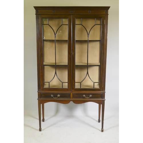 1097 - A Victorian mahogany Adam style display cabinet and two drawers with carved frieze over two astragal... 