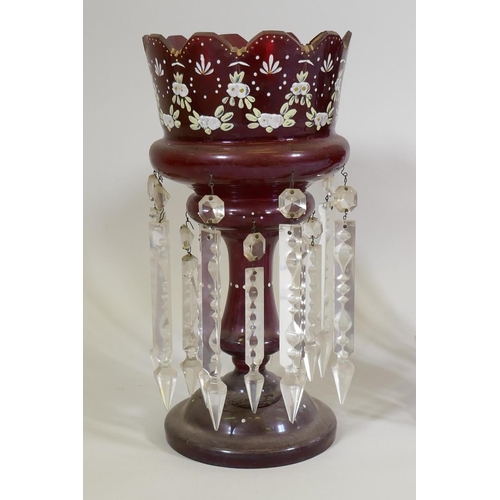 11 - A pair of C19th ruby glass lustres with enamel decoration, AF one base chipped, 37cm high