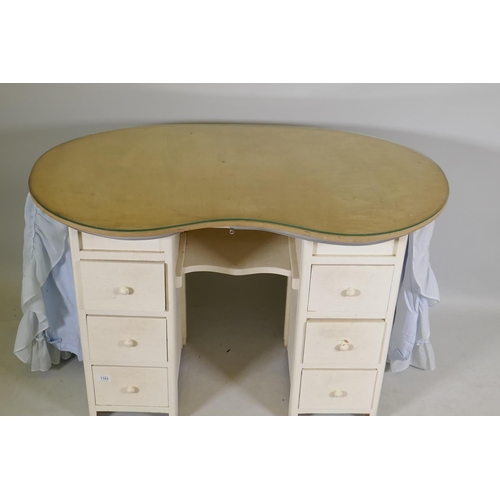 1103 - A vintage kidney shaped painted kneehole dressing table with six drawers and glass top, 108 x 55 x 7... 