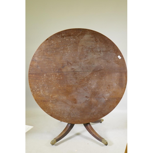 1105 - A Victorian mahogany tilt top breakfast table, raised on a twisted column and four splay supports, 1... 