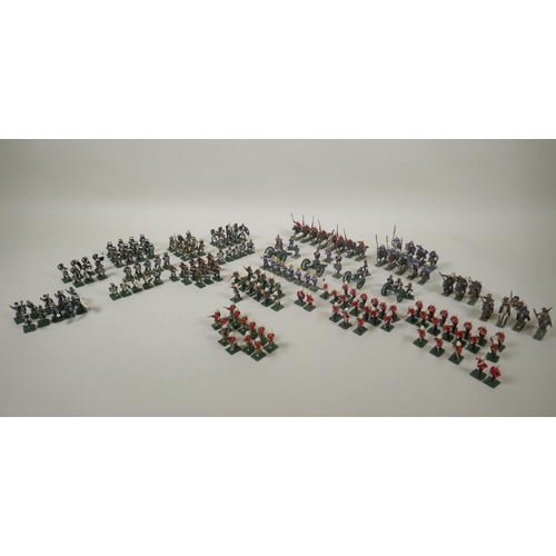 111 - A large collection of 22mm painted lead figures from the Zulu war, including British soldiers and ar... 