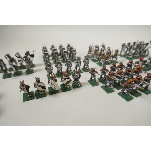 111 - A large collection of 22mm painted lead figures from the Zulu war, including British soldiers and ar... 