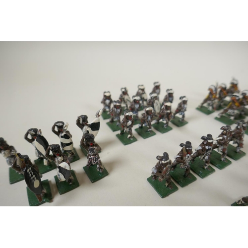 111 - A large collection of 22mm painted lead figures from the Zulu war, including British soldiers and ar... 