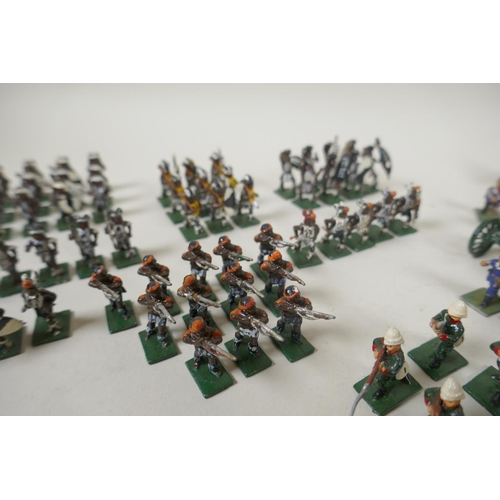 111 - A large collection of 22mm painted lead figures from the Zulu war, including British soldiers and ar... 