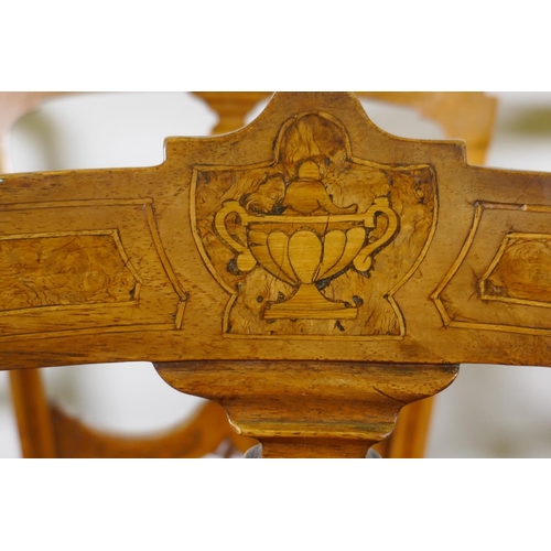 1110 - A set of six Victorian walnut dining chairs with burr walnut and classical urn inlaid decoration, up... 