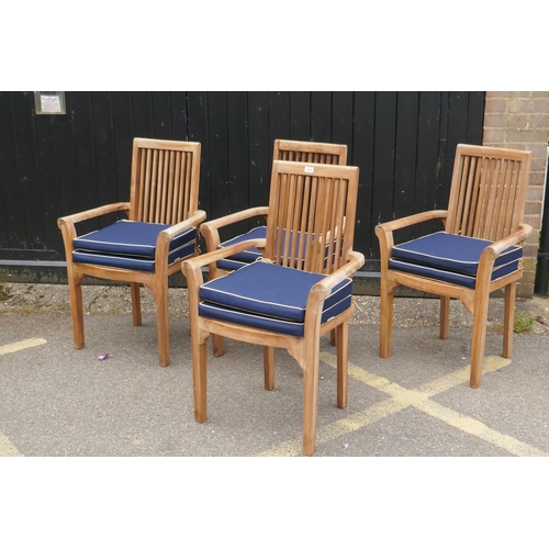 1112 - A set of four Faraway teak chairs with bespoke cushions