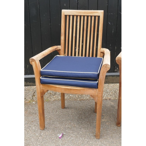 1112 - A set of four Faraway teak chairs with bespoke cushions