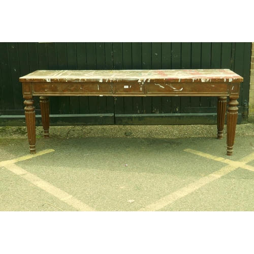 1117 - A mahogany on pine serving table with breakfront frieze and moulded decoration, raised on reeded sup... 