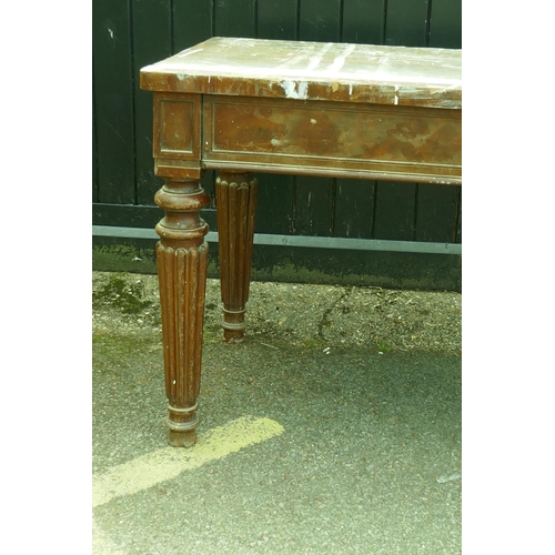 1117 - A mahogany on pine serving table with breakfront frieze and moulded decoration, raised on reeded sup... 