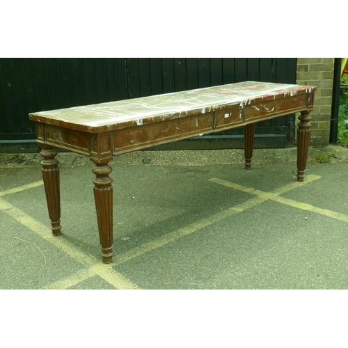 1117 - A mahogany on pine serving table with breakfront frieze and moulded decoration, raised on reeded sup... 