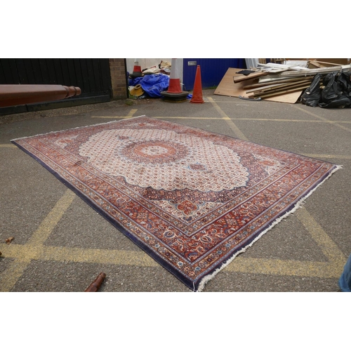 1120 - A Persian blue, cream and terracotta ground wool Kerman carpet, 202 x 292cm