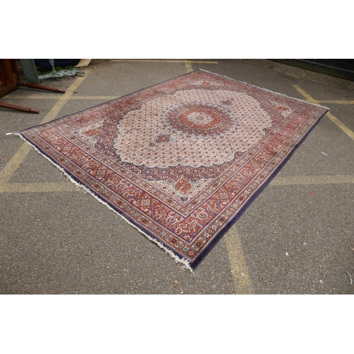 1120 - A Persian blue, cream and terracotta ground wool Kerman carpet, 202 x 292cm