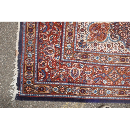 1120 - A Persian blue, cream and terracotta ground wool Kerman carpet, 202 x 292cm