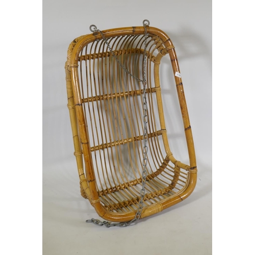 1125 - A vintage bamboo hanging swing chair, 64 x 99cm