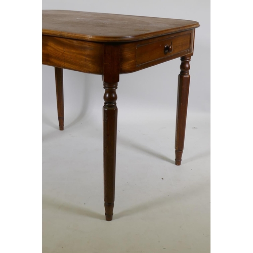 1131 - A Georgian mahogany centre table with drawer to each end, raised on tapering supports, adapted, 98 x... 