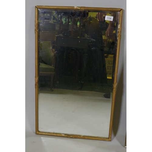 1134 - A vintage wall mirror with bevelled glass and reeded frame, AF, 45 x 73cm, and another smaller