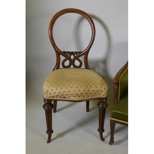 1135 - A C19th inlaid mahogany parlour chair and two side chairs with decoratively carved back, and a rosew... 