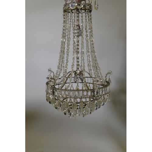 1138 - A vintage chandelier with four tiers of lustres, 70cm drop