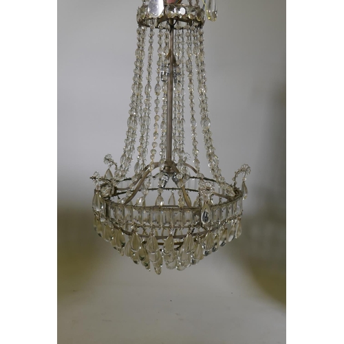 1138 - A vintage chandelier with four tiers of lustres, 70cm drop