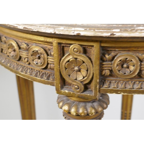 1141 - A Continental giltwood occasional table, with carved frieze, raised on fluted supports, early C20th,... 