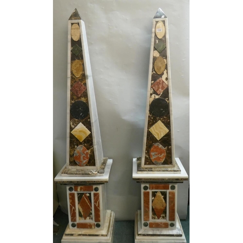 1144 - Pair of white marble obelisks inset with specimen marble, raised on pedestals, 182cm high