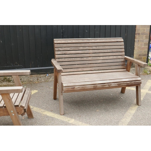 1147 - A Riverco weathered pine two seater garden bench and two chairs, and a matching refectory style tabl... 