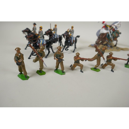 115 - A quantity of Britains painted metal figures, to include the Gurkha Rifles, set 8841; British Infant... 