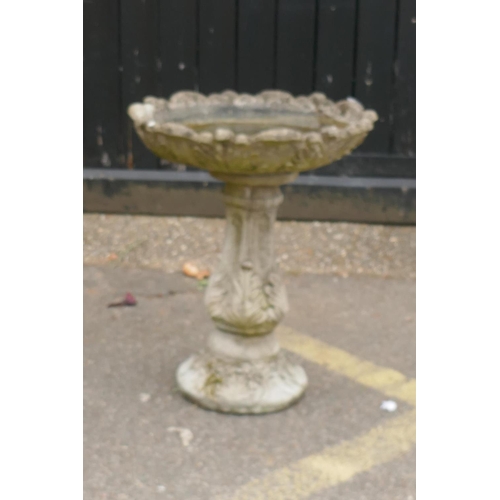 1154 - A concrete garden bird bath, 50cm diameter, 60cm high