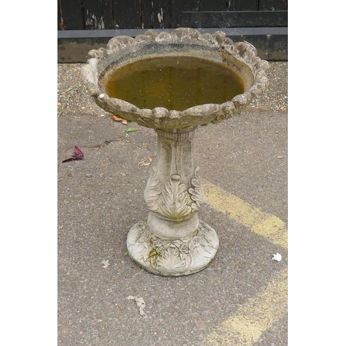 1154 - A concrete garden bird bath, 50cm diameter, 60cm high