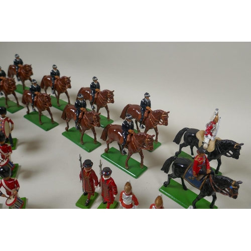 116 - A large collection of loose Britains painted metal models to include mounted Police Officers, HM The... 