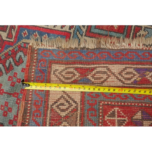 1165 - An antique Caucasian red ground wool Shirvan rug, 96 x 138cm