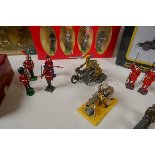 117 - A collection of assorted Britains, Corgi and Oryon military figurines, loose and boxed