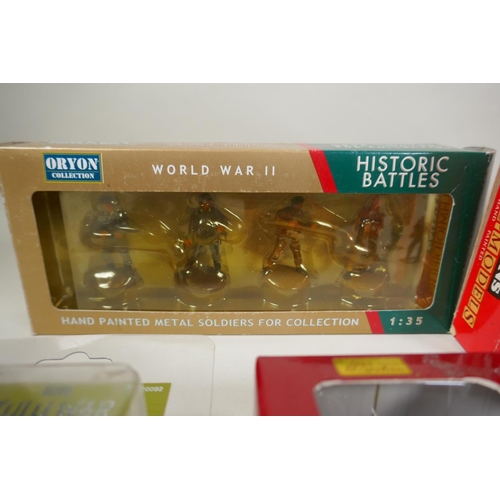 117 - A collection of assorted Britains, Corgi and Oryon military figurines, loose and boxed